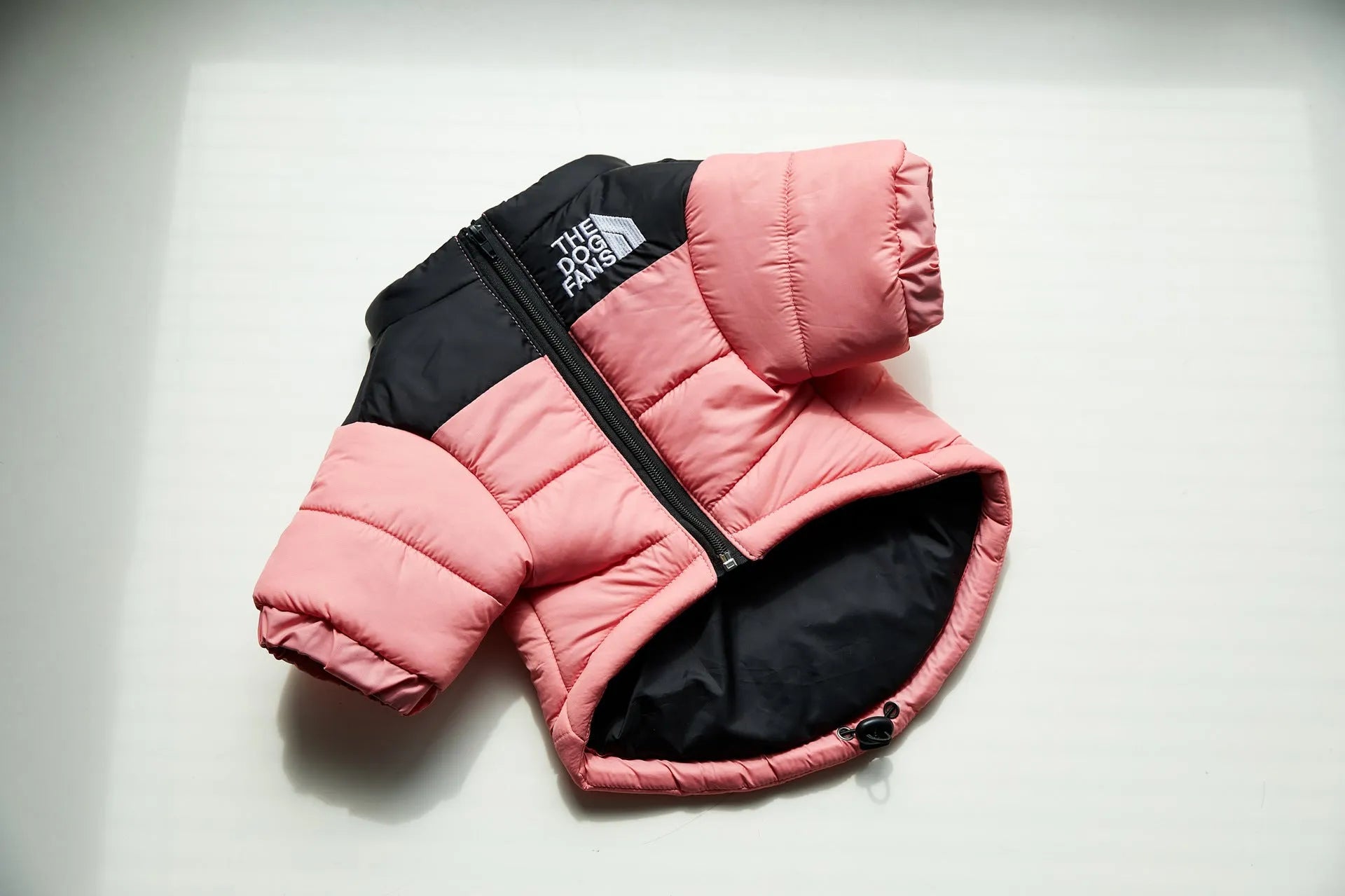 Windproof and rainproof polyester dog winter coat in dark green, available in multiple sizes