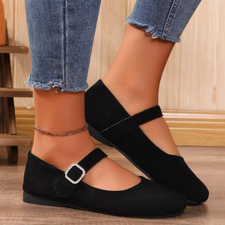 Black canvas fisherman shoes with rubber sole and low-top design