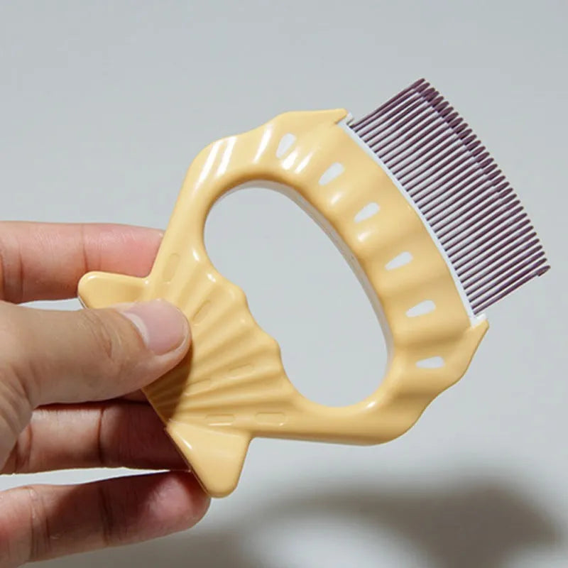 Shell-shaped plastic pet grooming brush with bent wire bristles and anti-slip handle in green colour