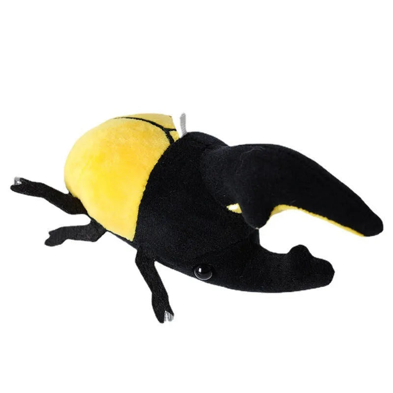 Small black rhinoceros beetle plush doll pendant with horns, 10cm tall, on a white background.