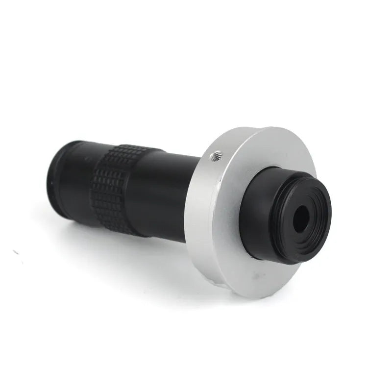 Black anodised aluminium industrial camera monocular lens for high-magnification inspection.