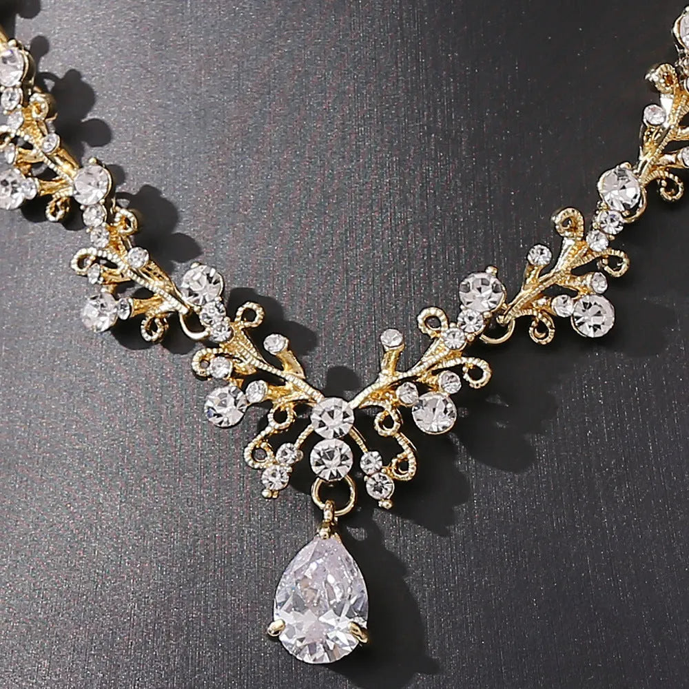 Bridal rhinestone zircon earring and necklace set in silver white finish on alloy base.