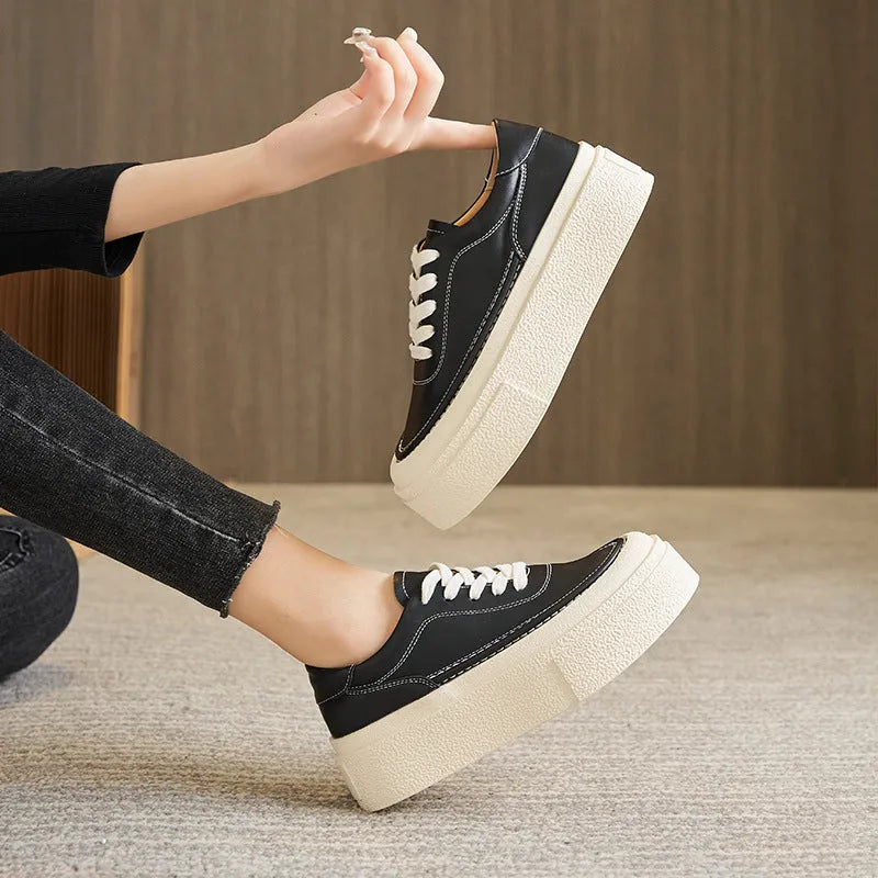 Women's black platform casual sports board shoes with tied design and round toe