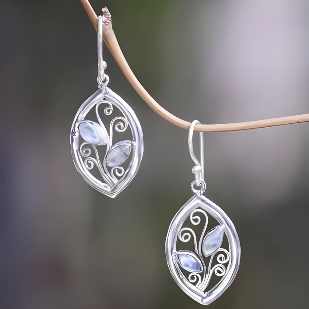 Women's silver leaf-shaped drop earrings with embedded colourful moonstone gemstones