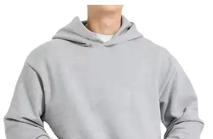 Man wearing a solid colour fleece-lined cotton pullover sweater with a wool lining.