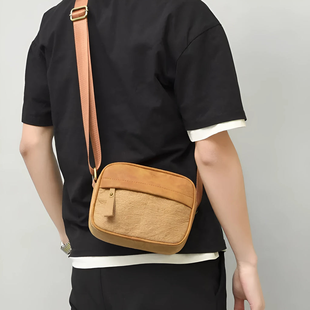 Men's paper crossbody bag in retro style with waterproof coating in black, brown, or silver colours