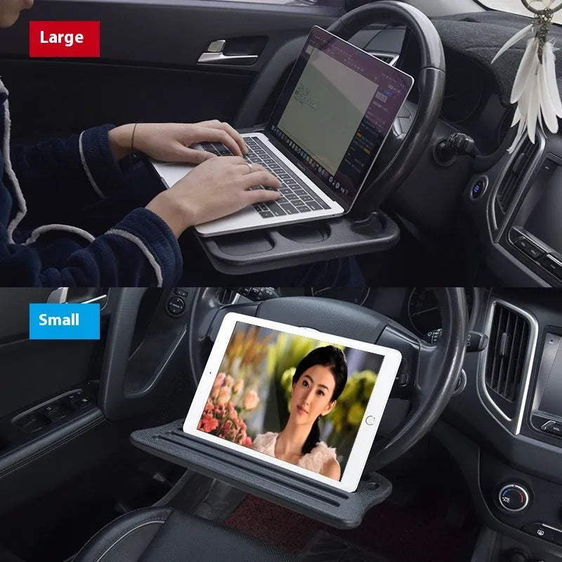 Large black PP steering wheel car desk tray with storage rack, placed over a steering wheel