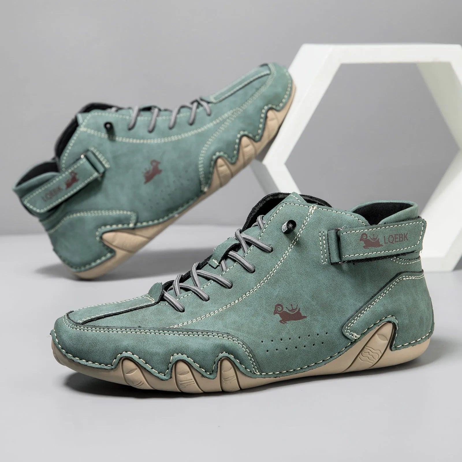 Men's brown high-top Martin boot with lace-up front, round toe, and flat rubber sole on a white background