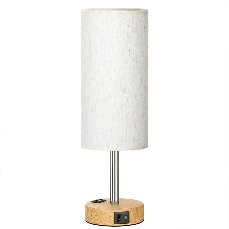 Night Wood Grain table lamp with metal base and three-gear touch dimming on a bedside table
