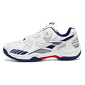 Yellow round-toe casual sneakers with microfiber and fabric upper on flat grey background