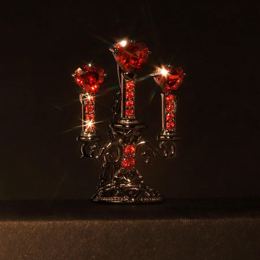 Gothic women's necklace with hollow candlestick pendant on a cross chain in retro finish.