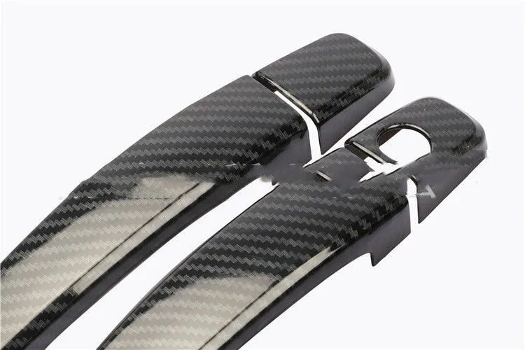 Carbon fibre pattern door handle cover for Opel Vauxhall Astra H and J models 2004 to 2015.
