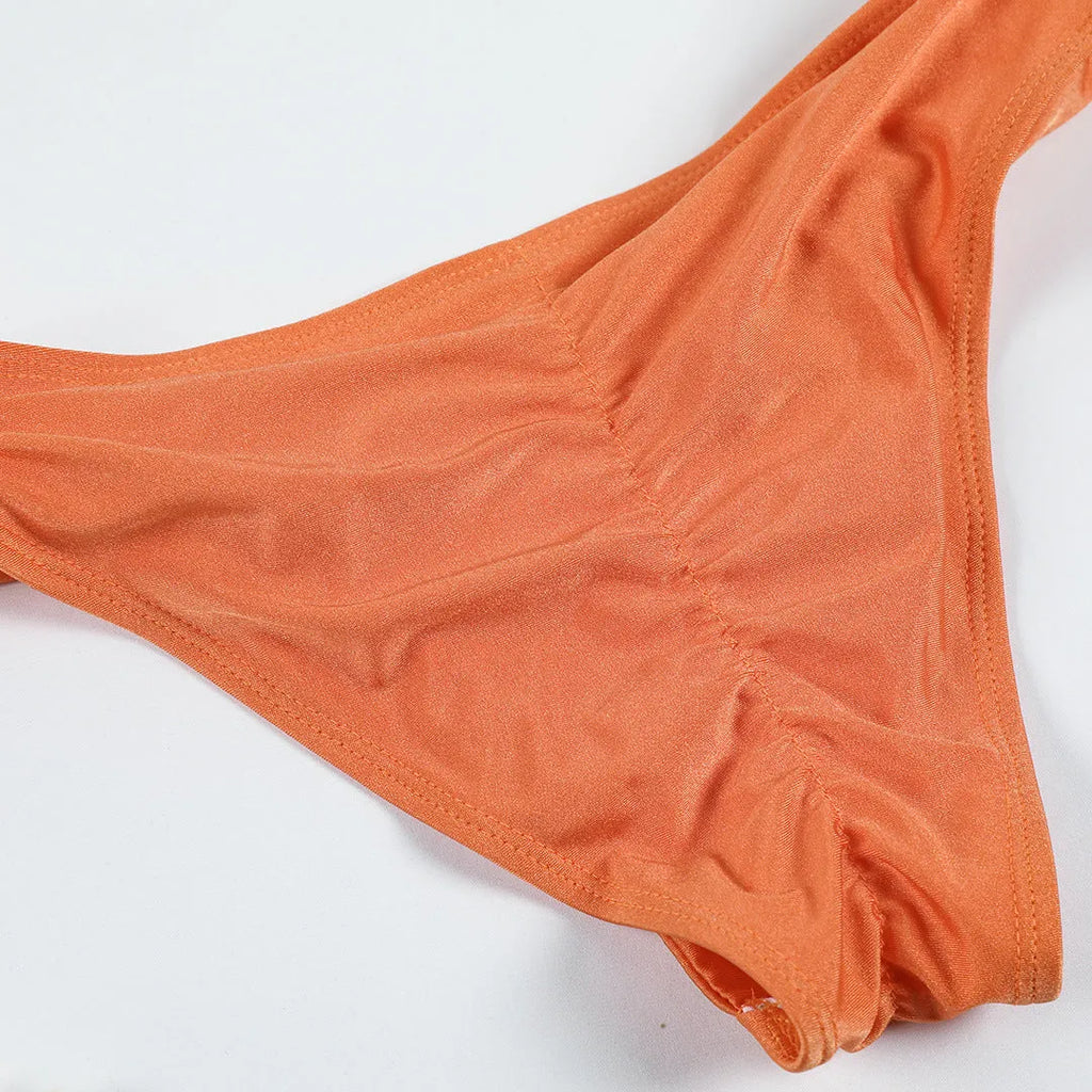 Women's knotted banded bikini set in solid colour, green or orange, sizes S M L, high elasticity polyester lining.