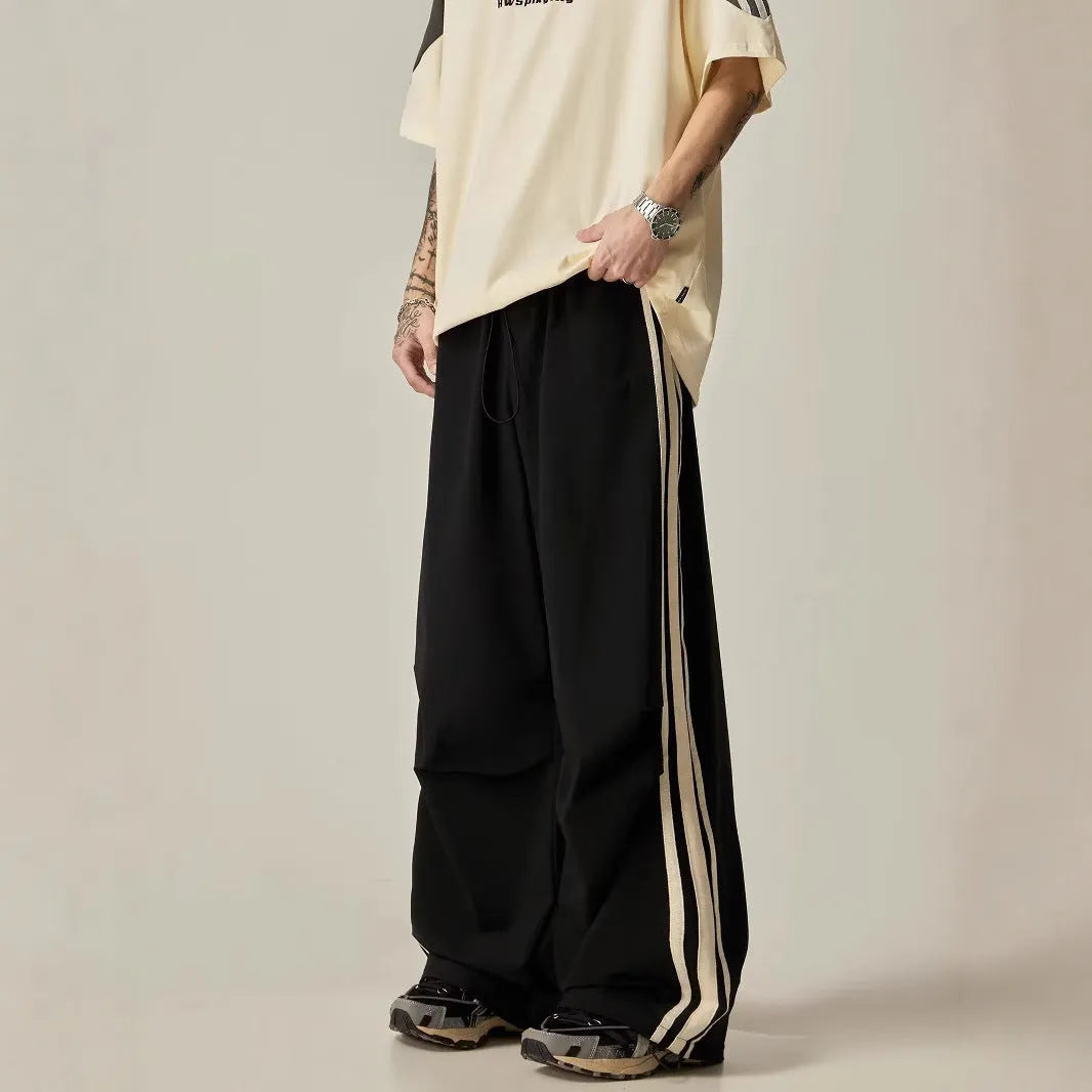 Men's black climbing trousers with high waist and straight wide-leg cut for summer wear