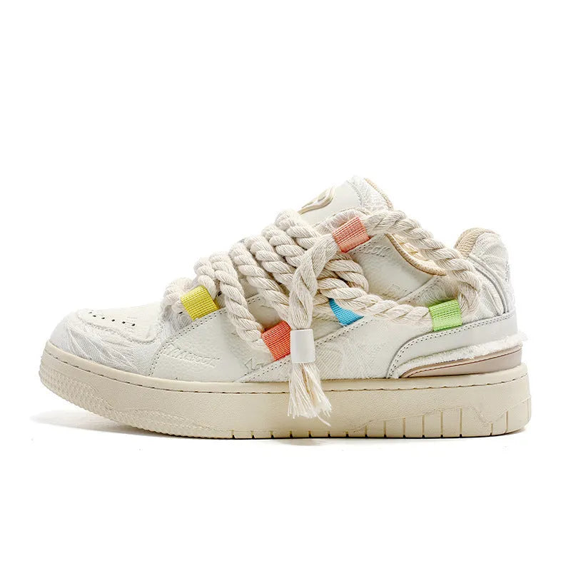 Creamy white retro skate shoes with candy-colour stitching and low platform heel