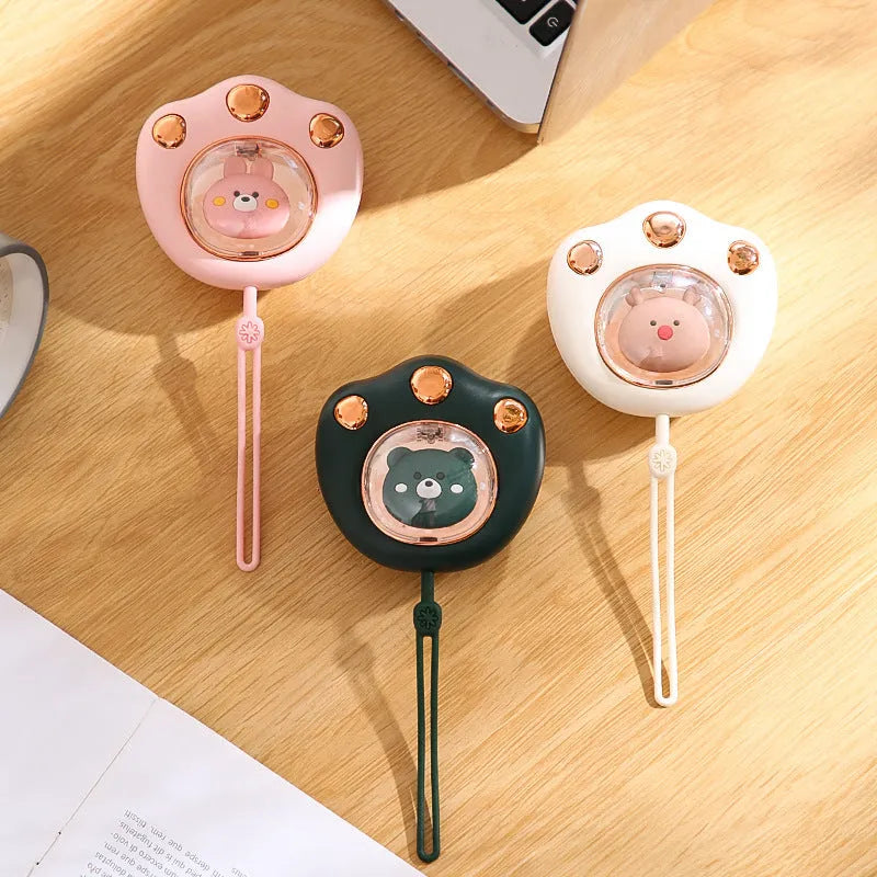 Mini electric hand warmer in cat paw shape, USB rechargeable, in white colour option, palm-sized