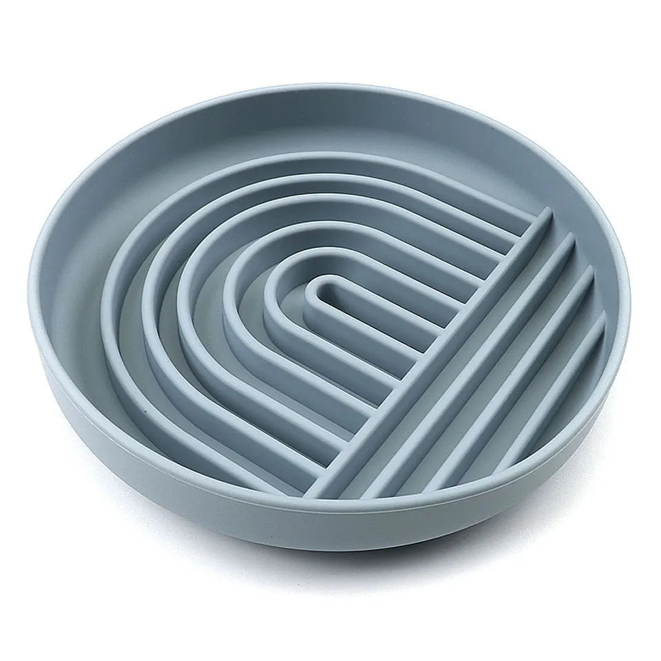 Silicone slow feeder dog bowl with textured ridges, shown in a choice of colours including beige and charcoal ash.