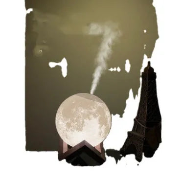 Wood finish spherical lunar humidifier and night light on a bedside table.