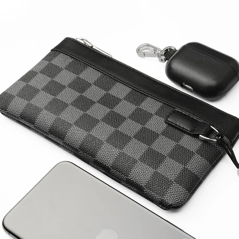 Men's black genuine leather clutch wallet showing front pocket profile and interior polyester lining