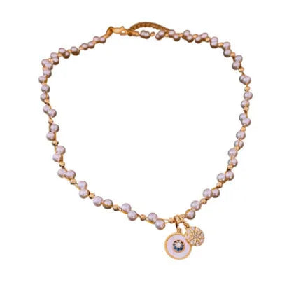 Gold electroplated women's necklace with round pearl pendant and adjustable clavicle chain