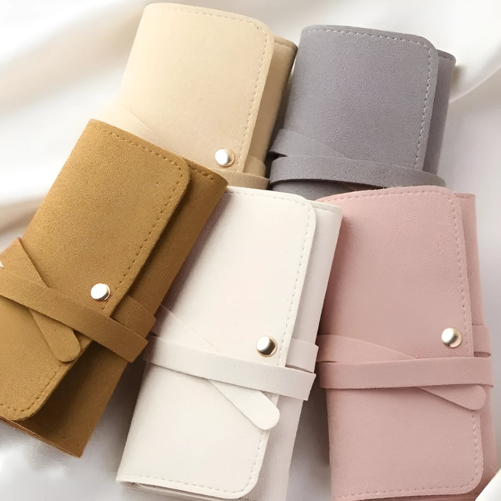 Soft brown leather and microfiber jewellery storage bag showing compact 12cm size.