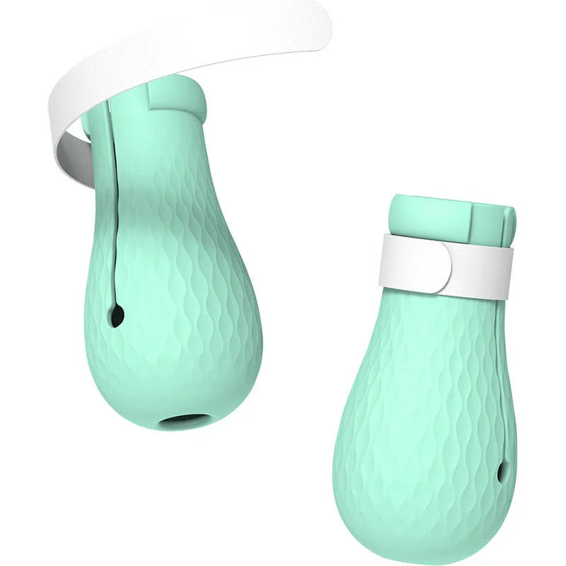 Green silicone cat anti-scratch foot covers with adjustable straps for pet handling
