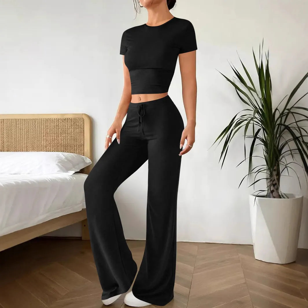 Women's black high waist trousers and short sleeve T-shirt two piece suit on hanger