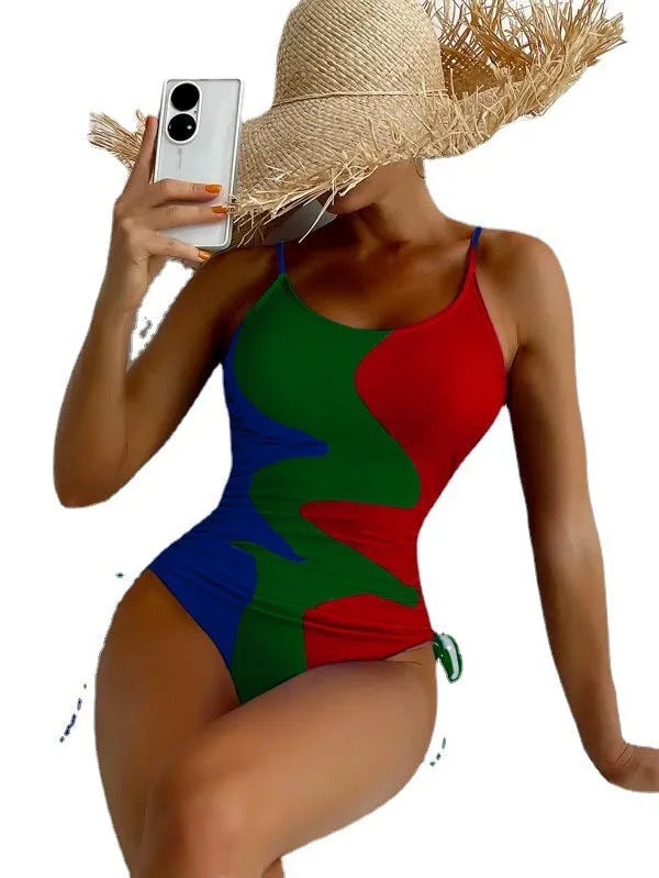 Women's blue sleeveless one-piece swimsuit with fixed swimming trunks on a white background.