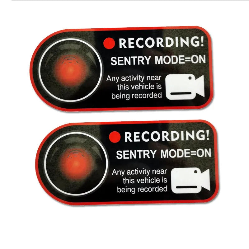 Tesla Sentry Mode electrostatic warning sticker measuring 11x5cm with English security text