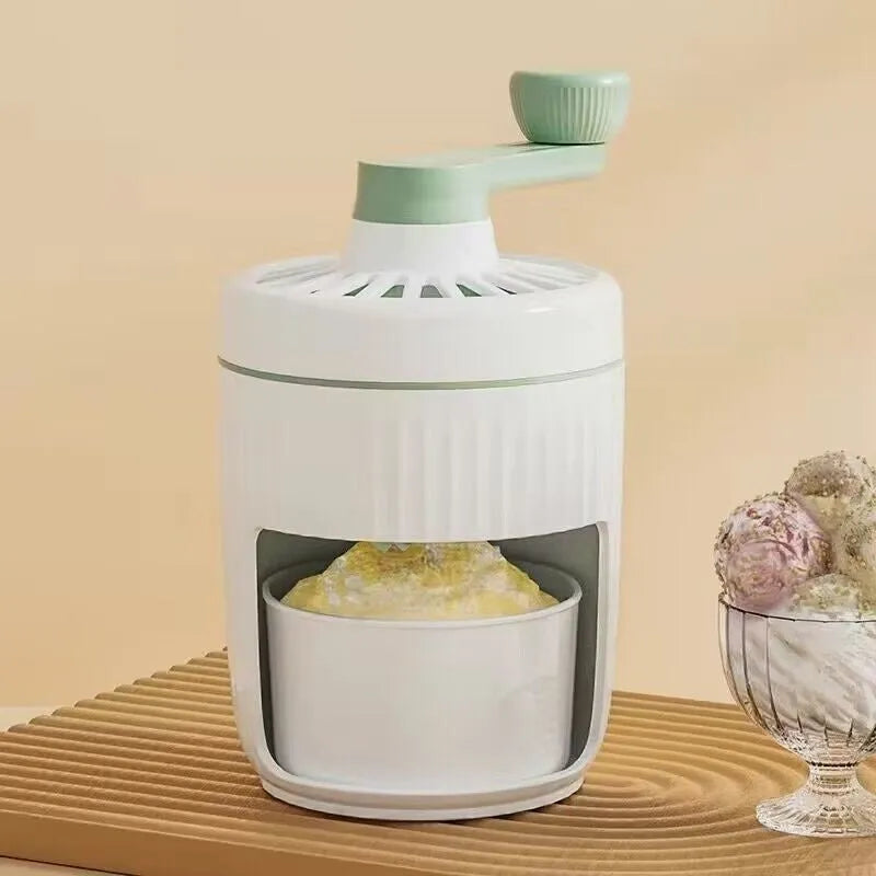 Hand-cranked ice shaving machine in green and orange, with removable ice box and ergonomic handle