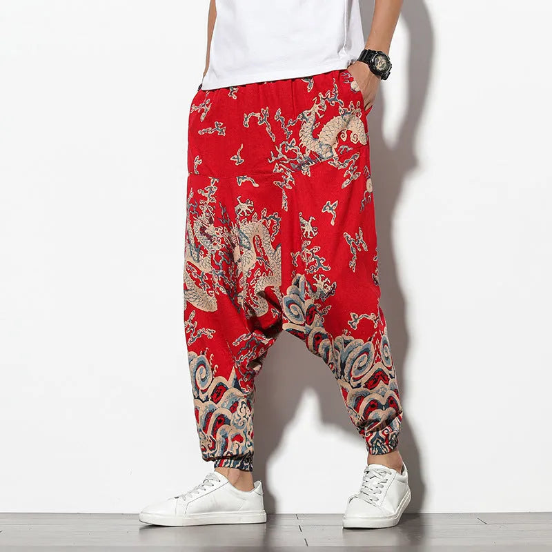 Cotton wide-leg beach trousers with elephant flower print in blue fan colour, nine-point length, mid-waist