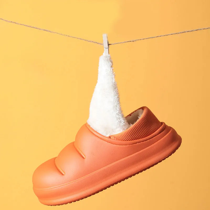 A pair of waterproof EVA couple slippers in various colours, showing plush lining and a non-slip sole.