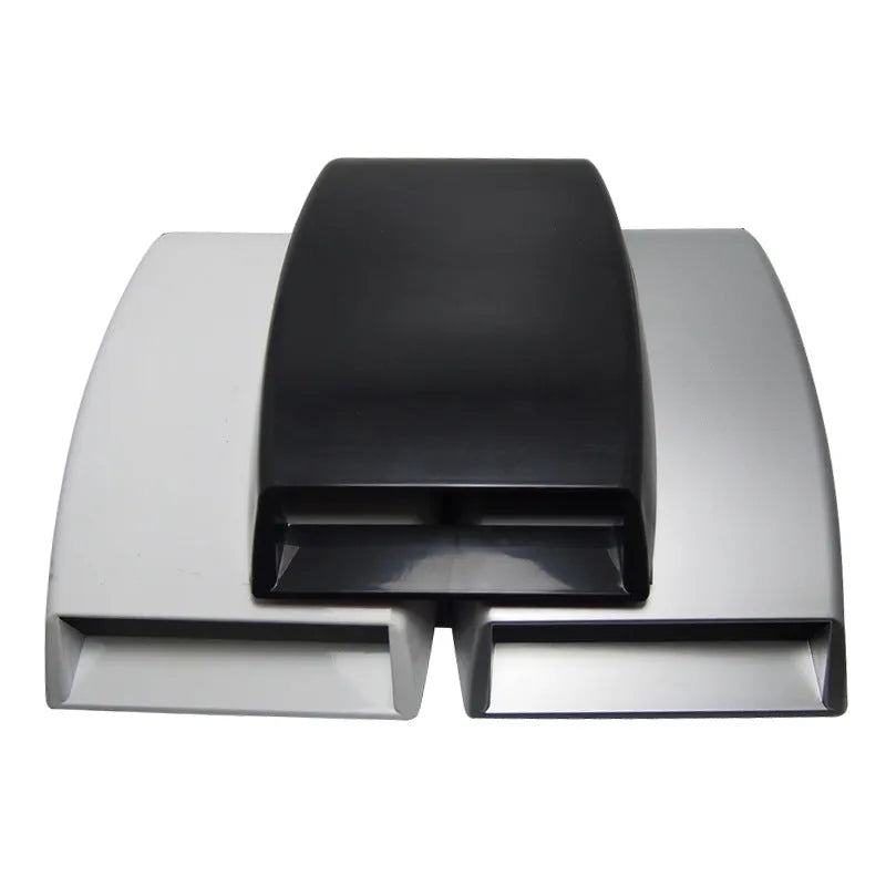 Car dashboard decorative vent accessory in ABS plastic showing black, white, and silver colour options