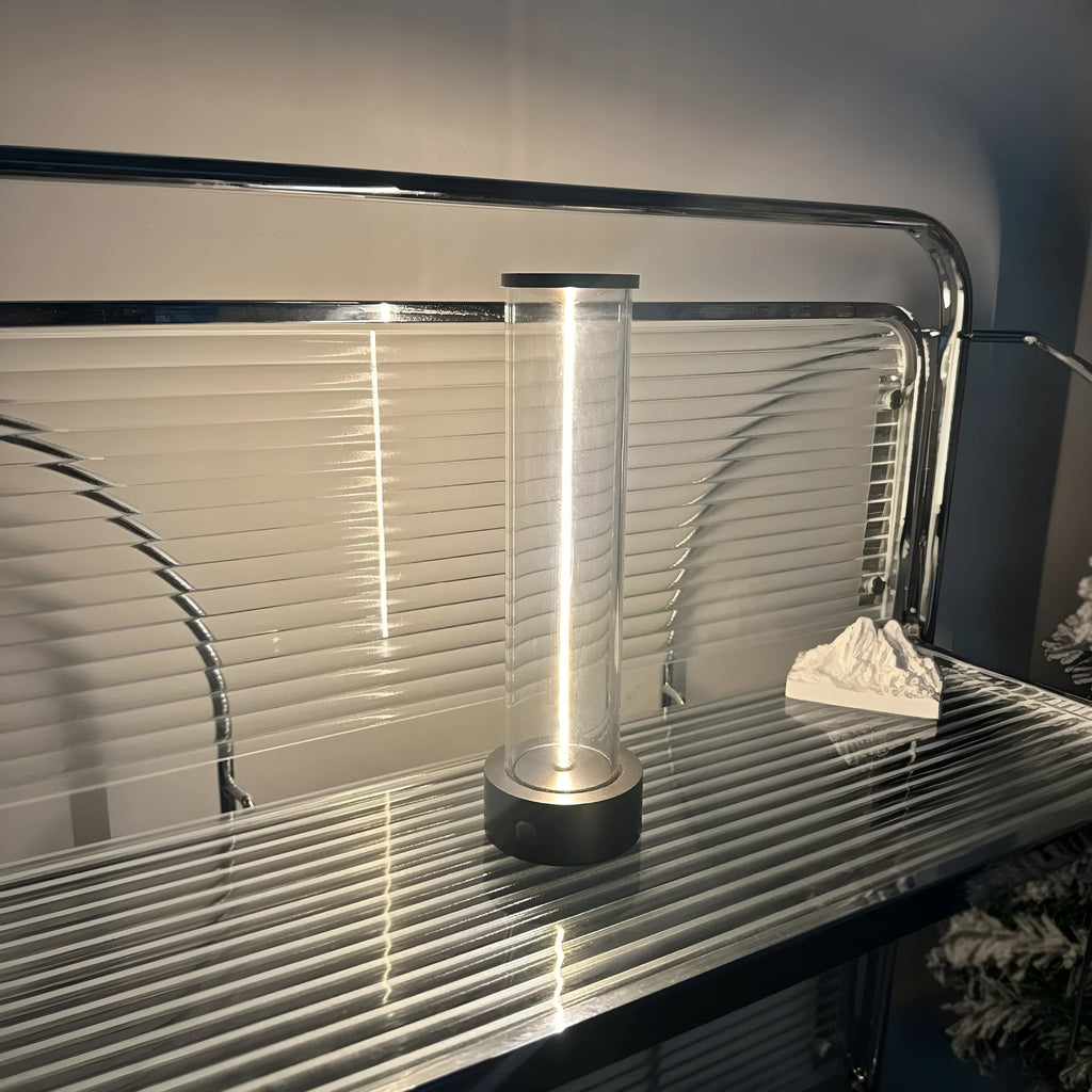 Modern white LED light strip with glass and magnetic base for USB charging