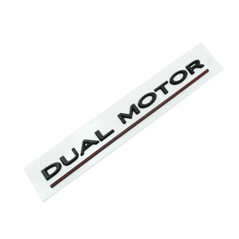Black and red ABS plastic Double Motor performance badge sticker for Tesla Model 3 bumper.