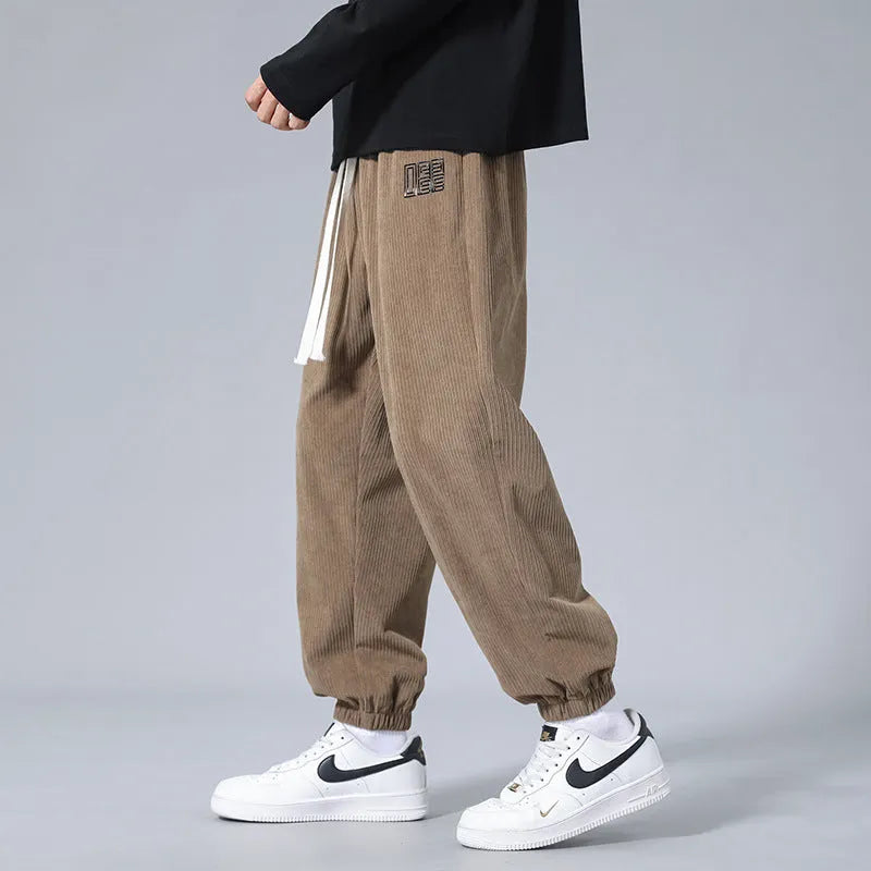 Men's workwear casual sports trousers in polyester fibre with letter print, available in black, dark gray, and khaki