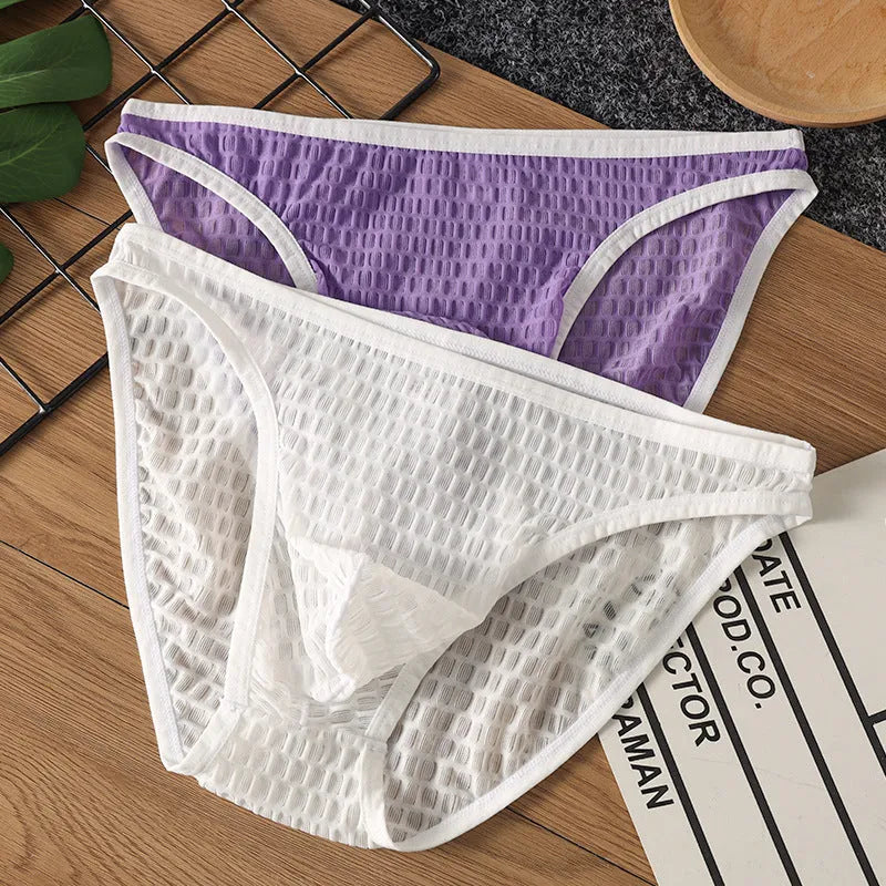 Men's low waist transparent underwear in nylon lace fabric showing breathable quick-drying design