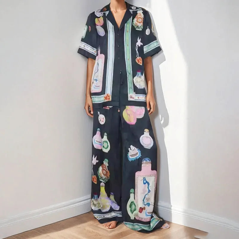 Black women's cardigan and trouser set with cartoon animation pattern