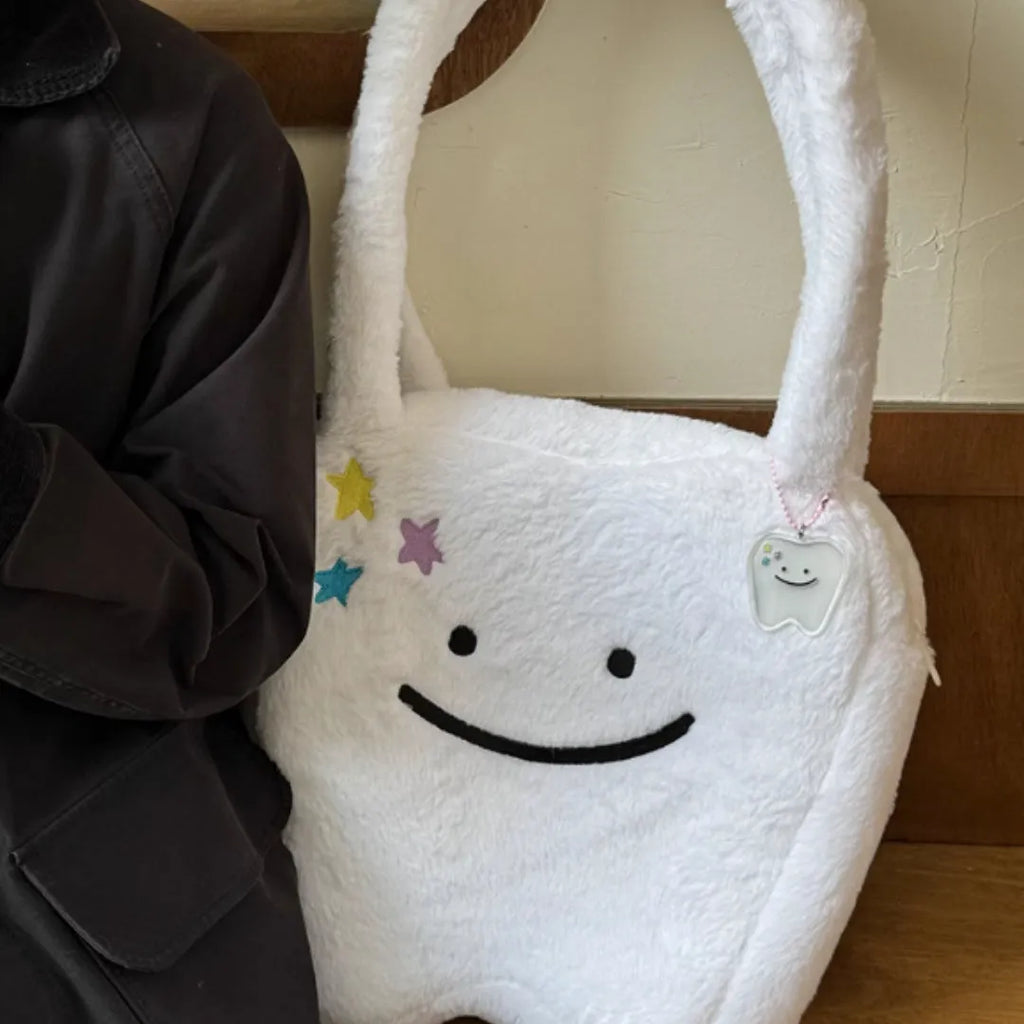 White plush large tooth shoulder tote bag with cute teeth design and crossbody strap