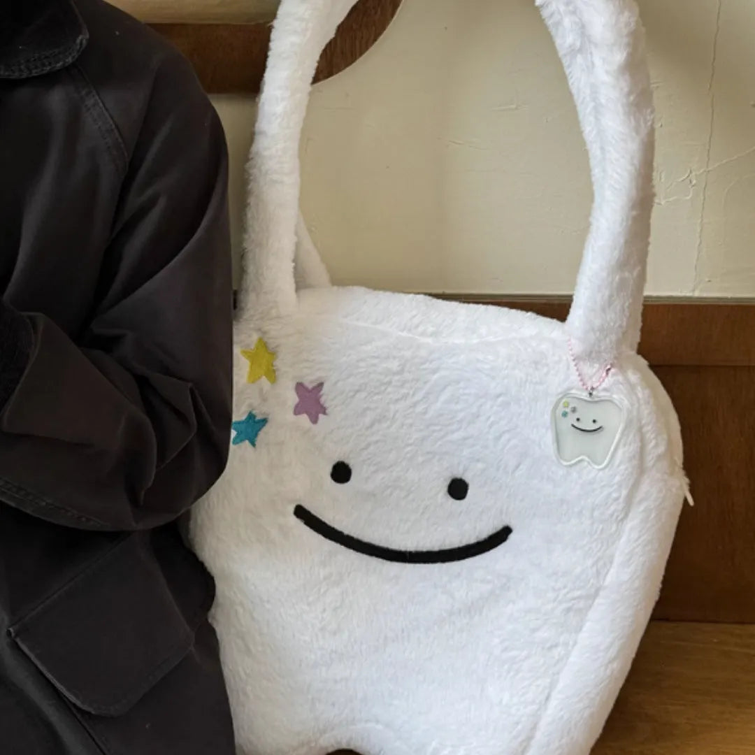 White plush large tooth shoulder tote bag with cute teeth design and crossbody strap