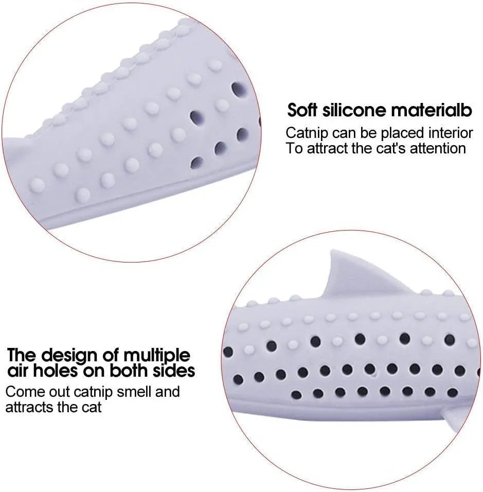 Green silicone fish-shaped chew toy for cats on a white background.