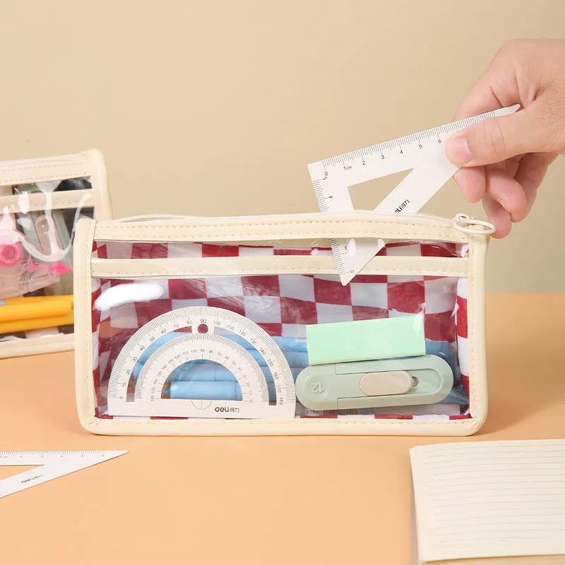 Transparent PVC pencil case with chessboard pattern showing pens inside