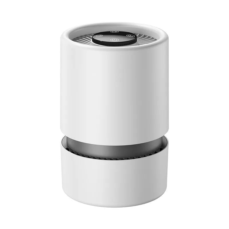 White desktop air purifier with USB cable on a wooden desk