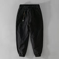 Men's cotton overalls with ankle banding and drawstring waist in army green
