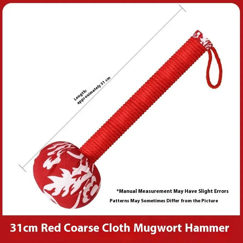 Argy wormwood massage hammer in green colour showing hand-held design for neck and shoulder massage