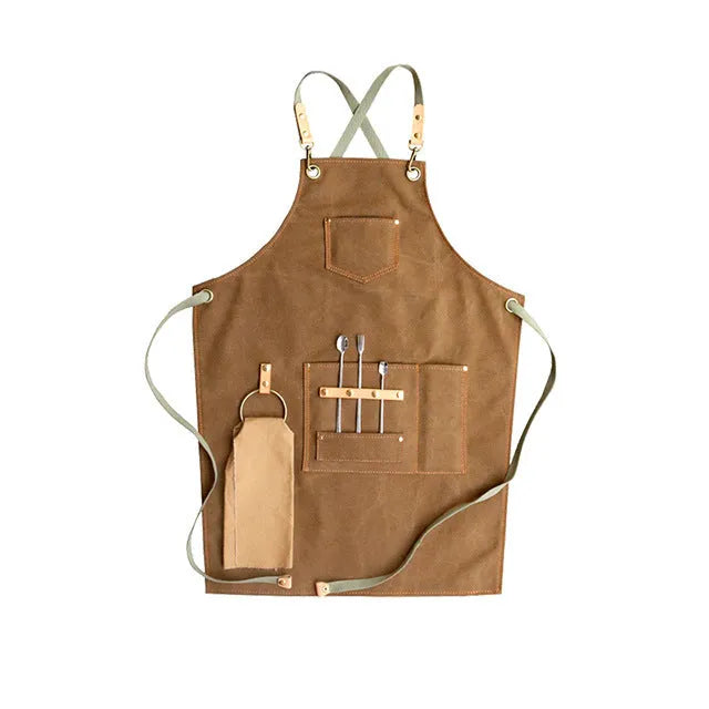 Canvas work apron with cross-back straps in camel colour for cafe and baking use