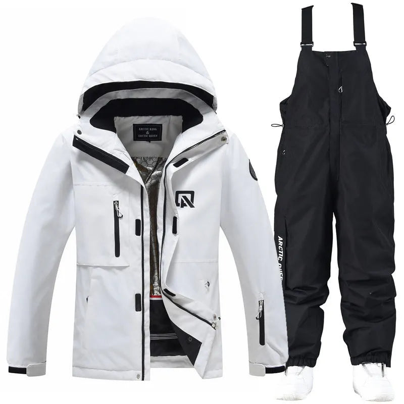 Blue and black two-piece ski suit for men and women on snowy mountain background