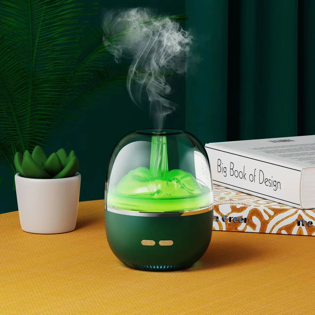 Green ultrasonic humidifier with colourful gradient light on desk showing heavy mist output