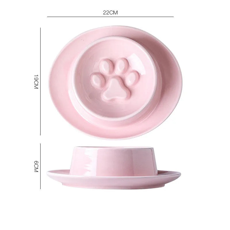 Green ceramic slow feed pet bowl with a central mound and obstacles to prevent fast eating.