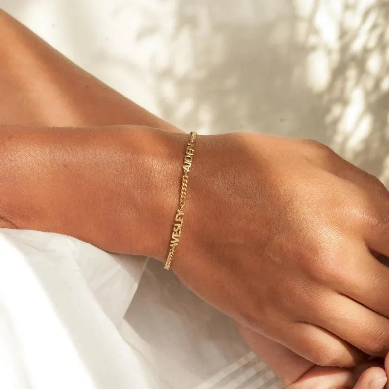 Gold DIY personalised name bracelet Cuban chain stainless steel with engraved name close up